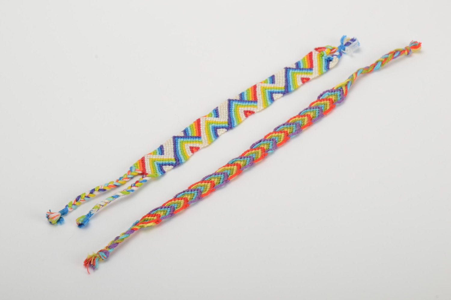 Set of 2 handmade friendship wrist bracelets woven of colorful embroidery floss photo 2