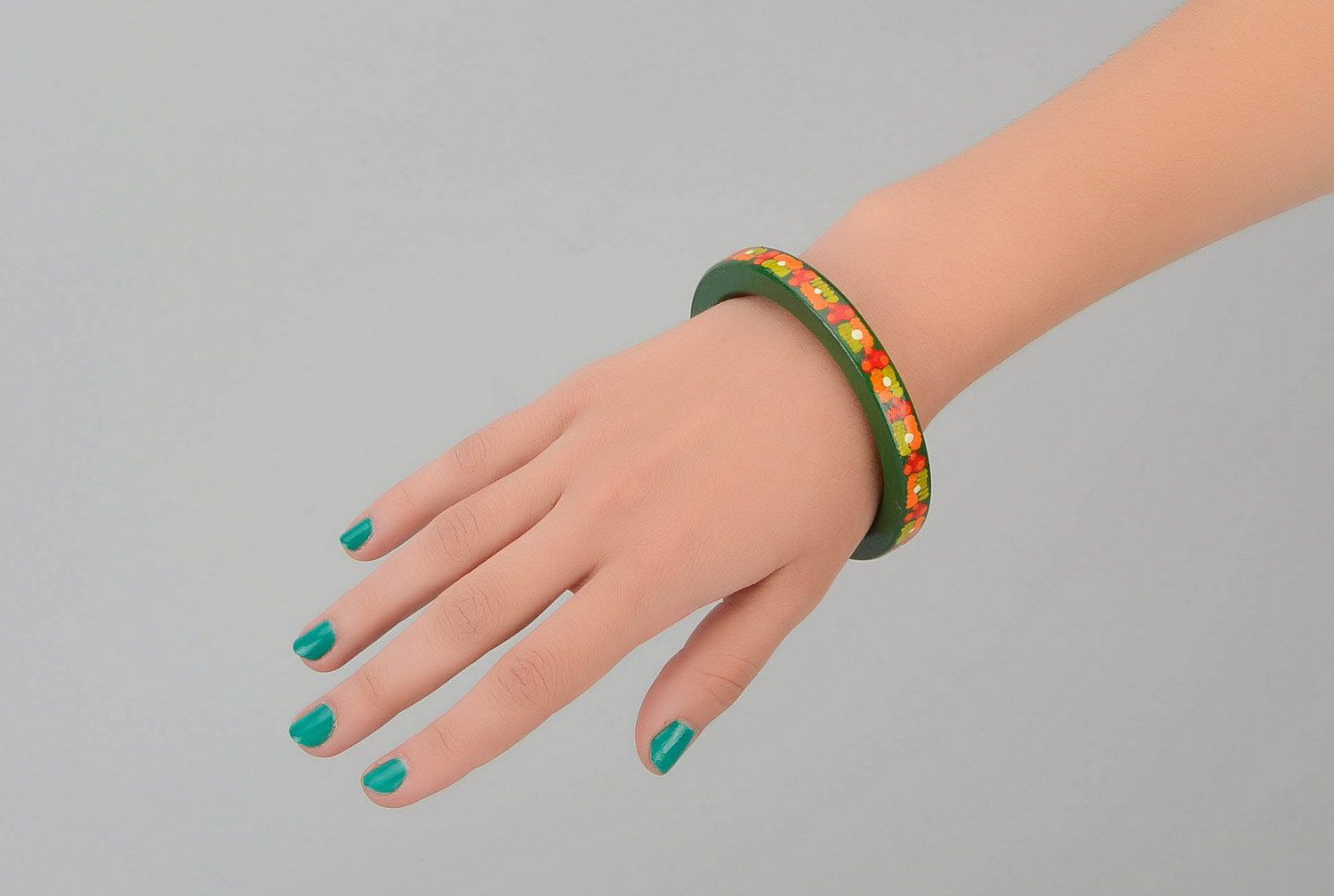 Wooden bracelet of green color photo 5
