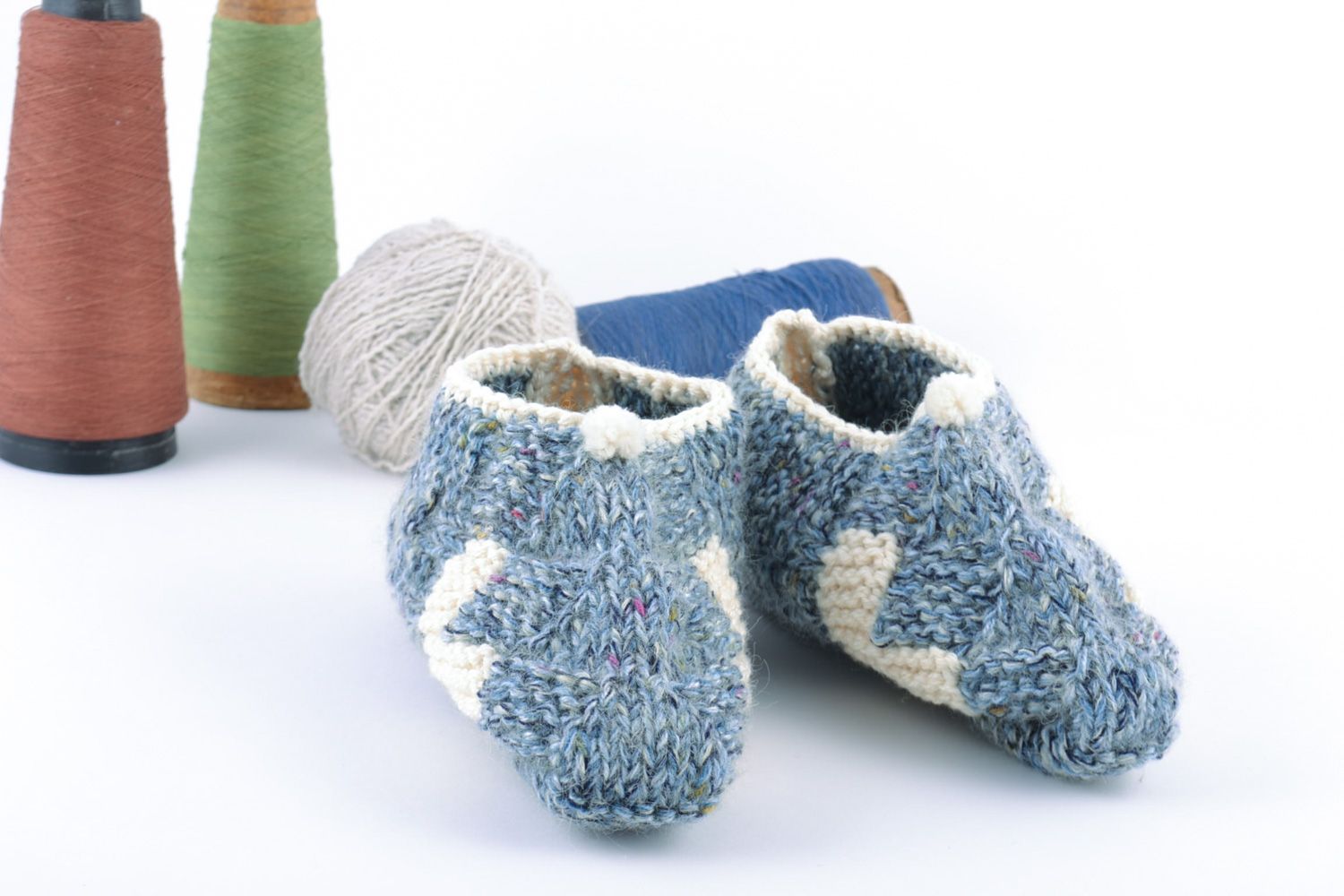 Beautiful warm handmade knitted half-woolen slippers of blue color photo 1