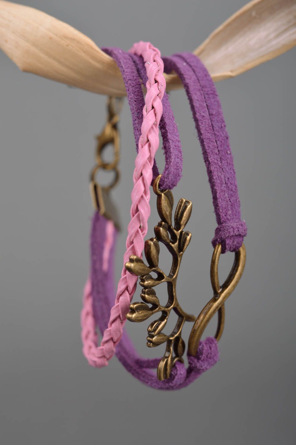 Handmade violet and pink suede cord multi row wrist bracelet with metal inserts photo 3