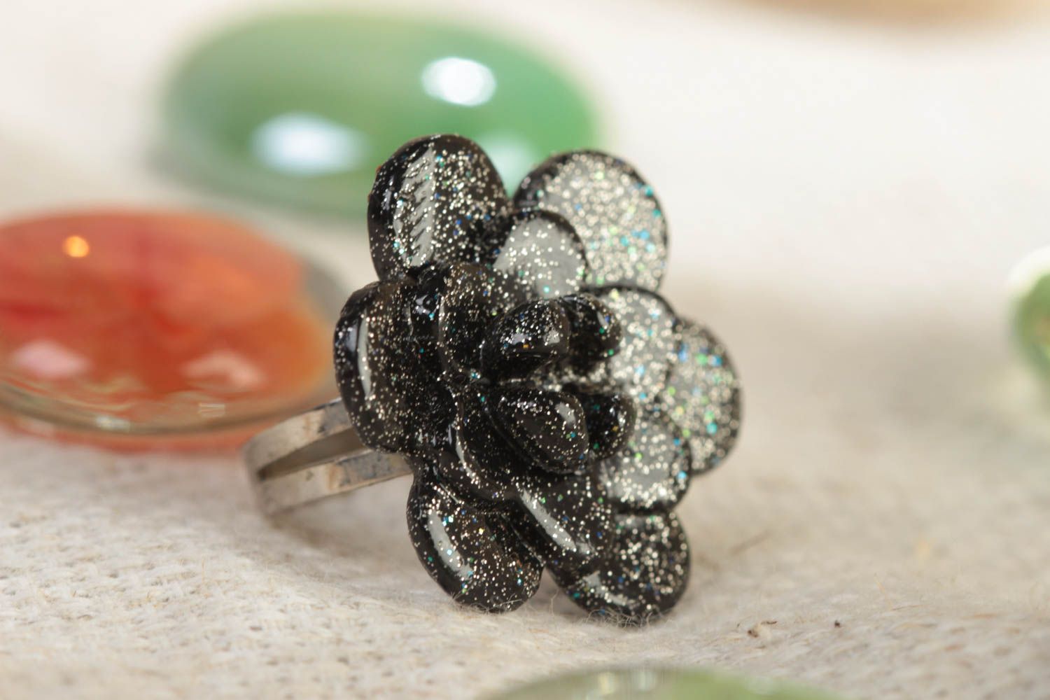Handmade designer jewelry ring with black polymer clay flower with sparklets photo 1