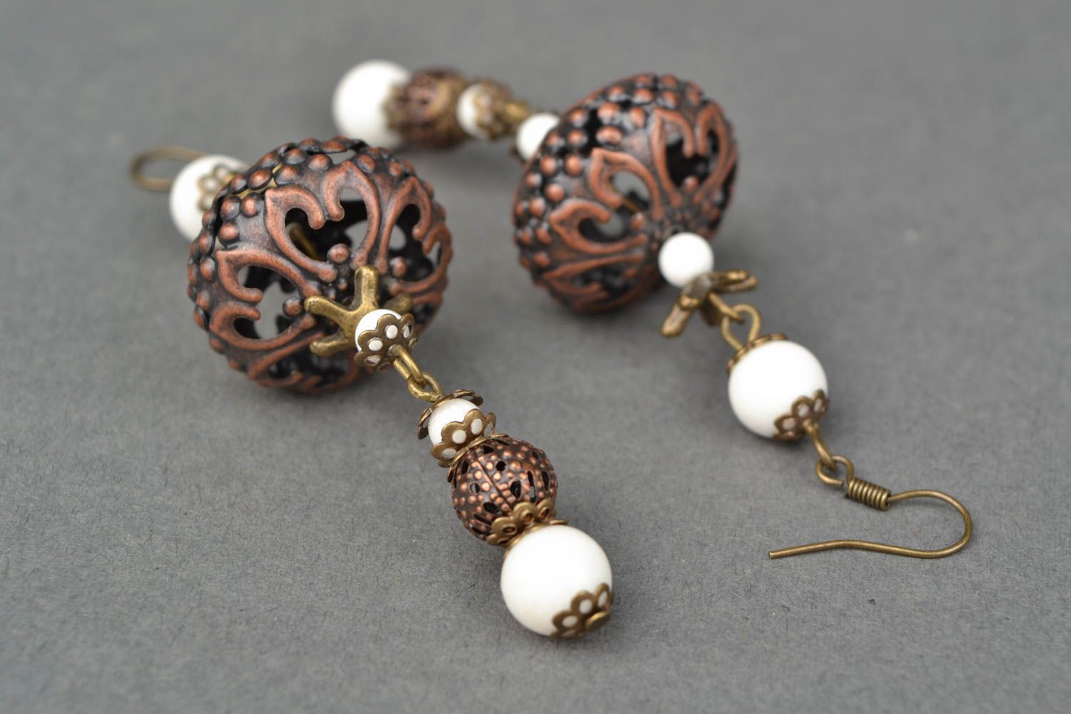 Metal earrings with ceramic beads photo 4