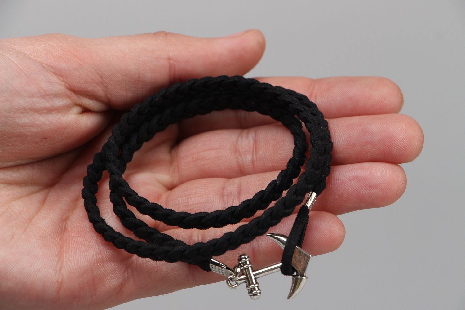 Handmade friendship bracelet woven of faux suede cord of black color with anchor photo 3