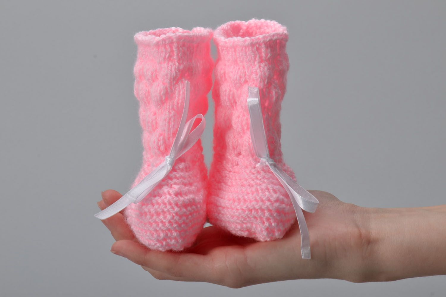Pink knitted baby booties photo 5