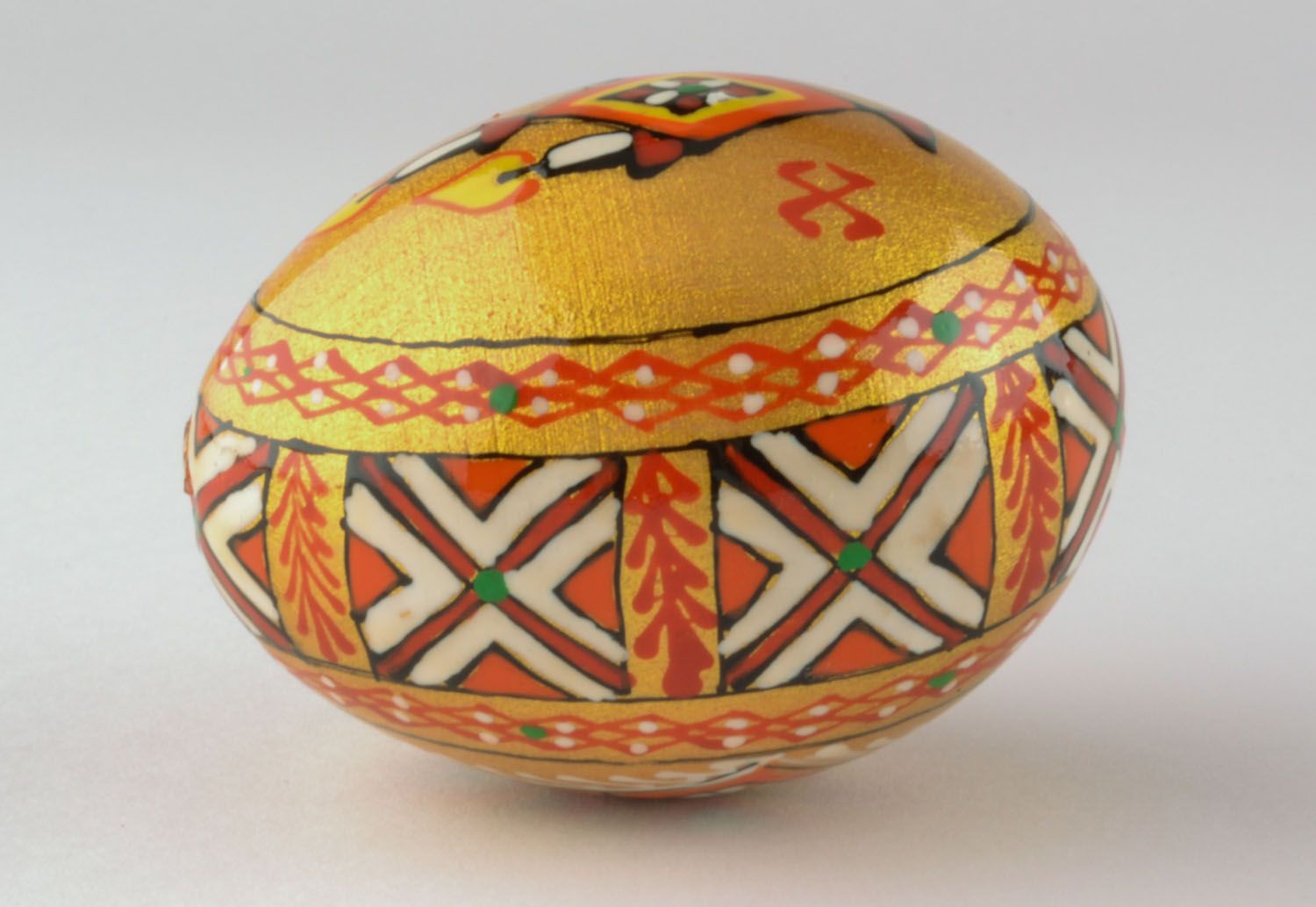 Golden wooden egg with painting photo 3