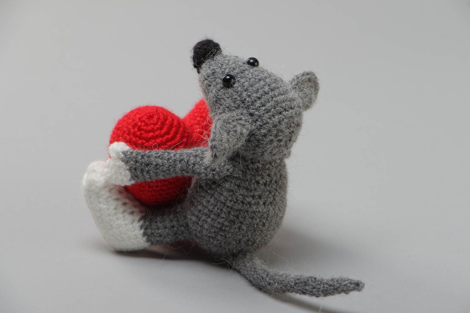 Handmade soft toy crocheted of acrylic threads small gray mouse with red heart photo 4