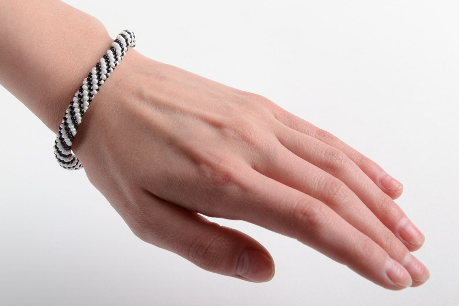 Handmade beautiful wrist bracelet made of Czech beads black and white for women photo 5