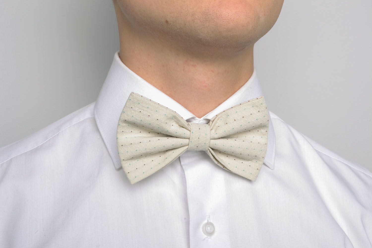White suit bow tie photo 1