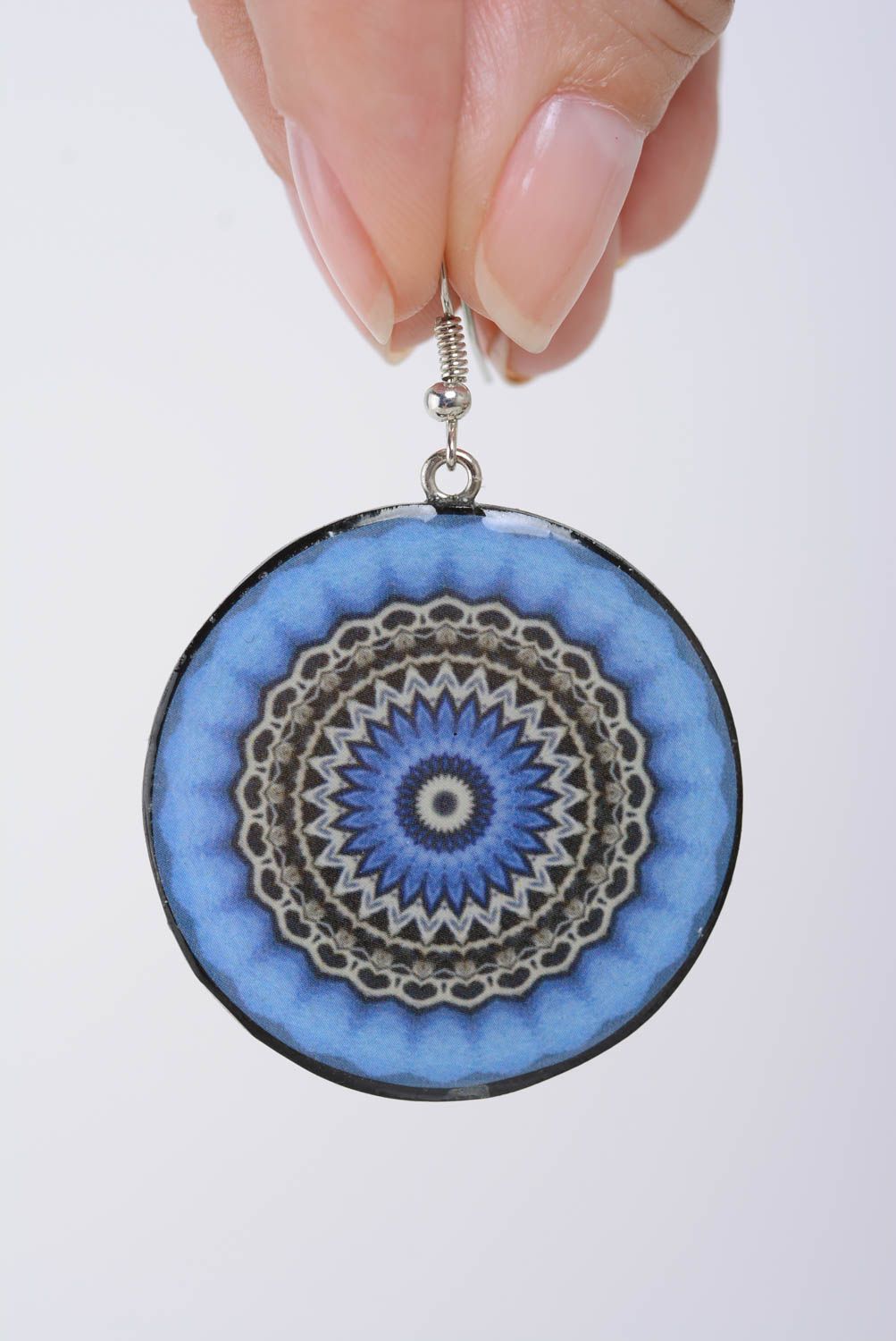 Round earrings in ethnic style made of polymer clay with blue ornament  photo 4
