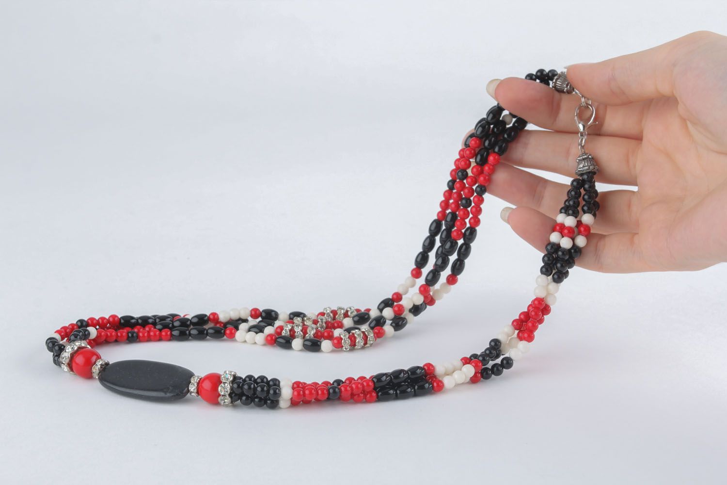 Red and black necklace with natural stones photo 5