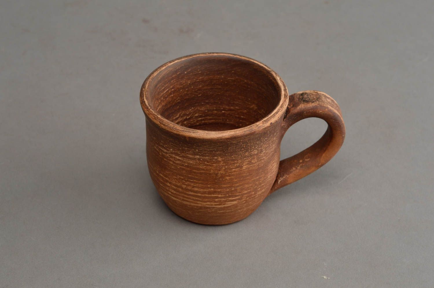 Old fashion rustic brown color clay cup with handle and no pattern photo 3