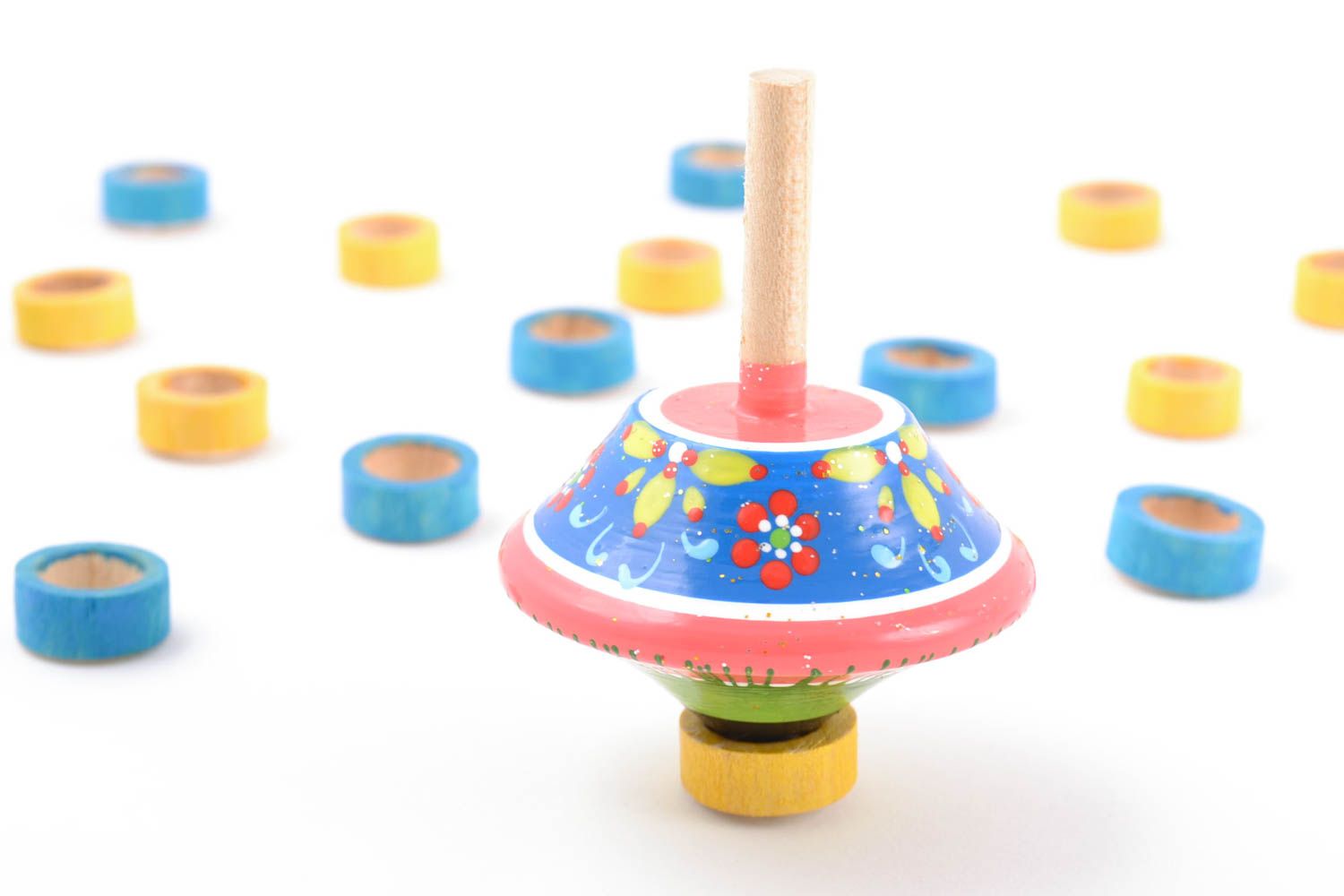 Pink handmade wooden spinning top toy painted with eco dyes photo 1