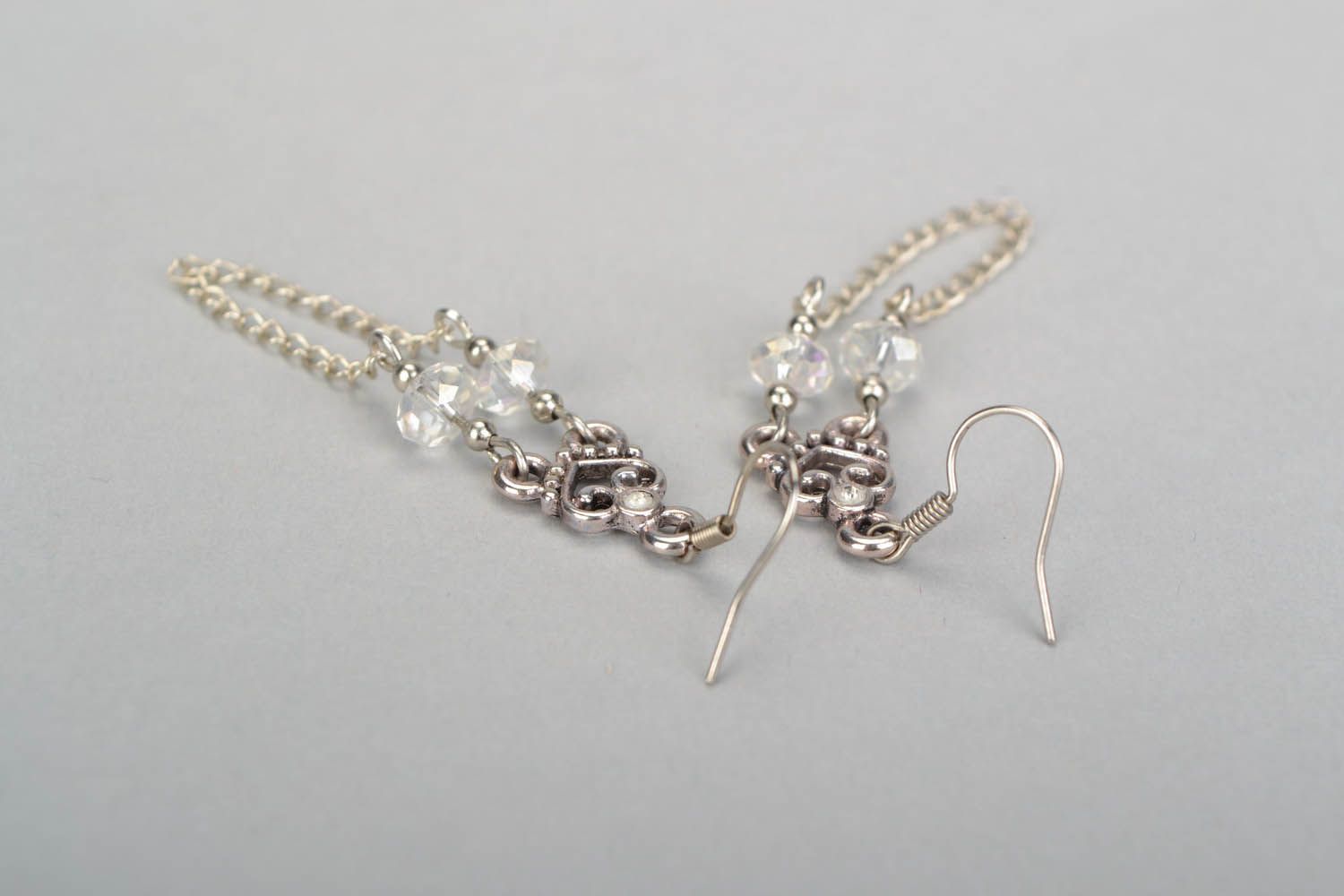 Metall Ohrringe mit Kristall-Perlen foto 5