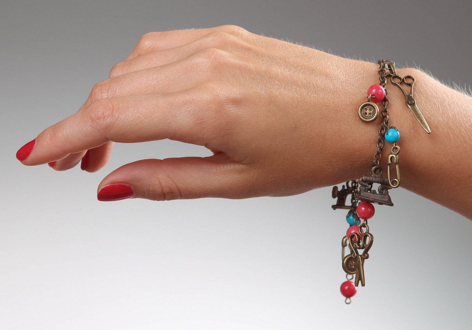 Bronze bracelet with coral and turquoise photo 5