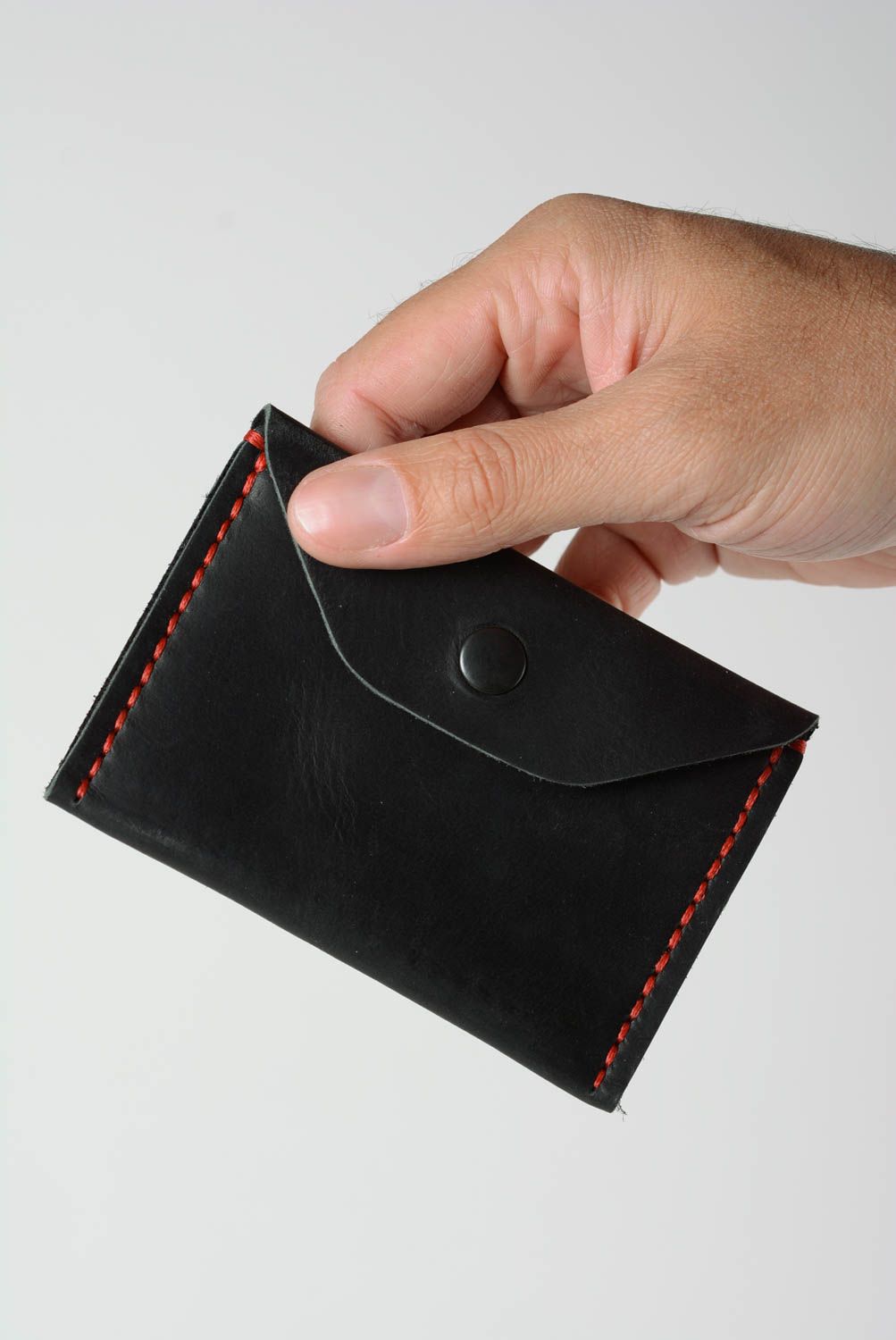 Handmade designer small coin wallet sewn of genuine black leather for women photo 2