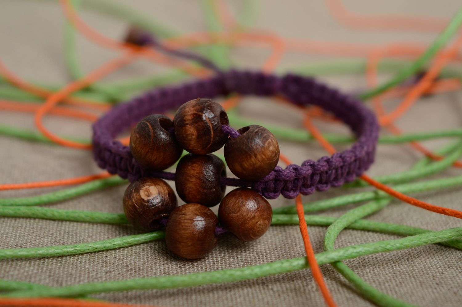 Macrame bracelet with wooden beads photo 2