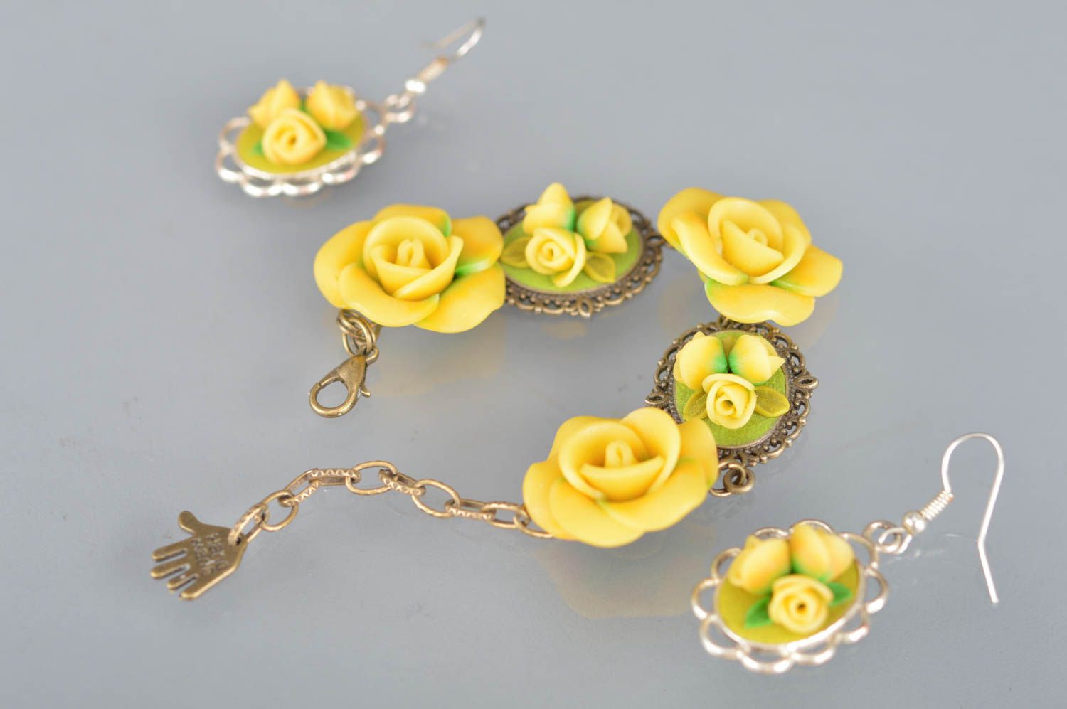 Handmade set of jewelry made of polymer clay bracelet and earrings yellow roses photo 1