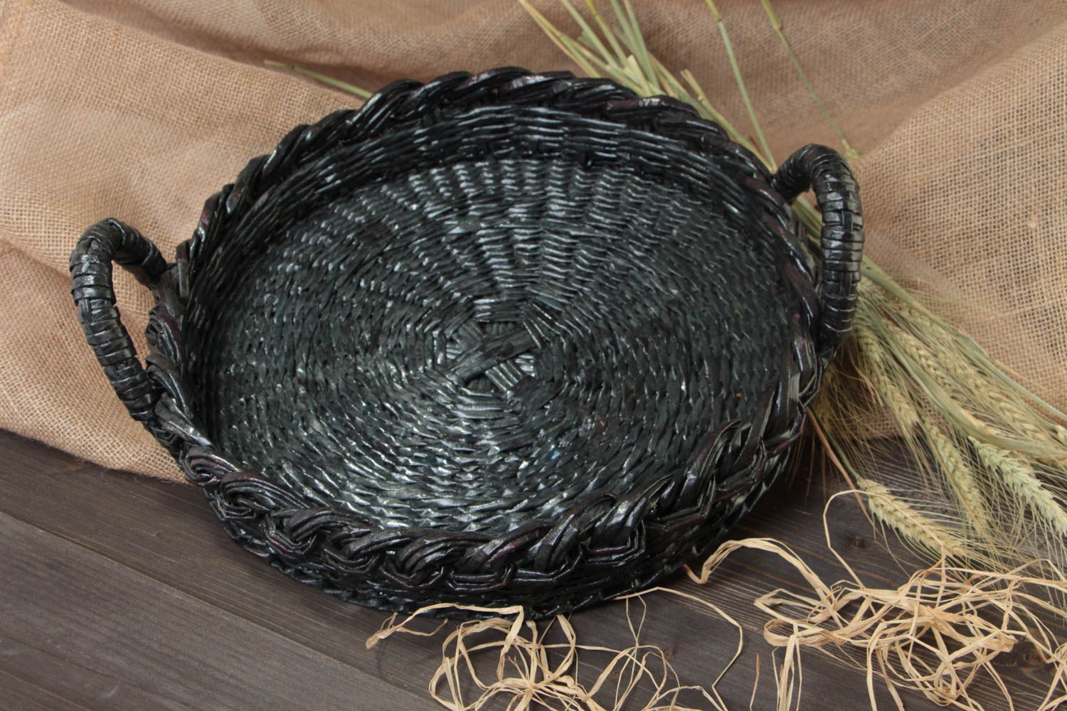 Handmade black round fruit tray with handles woven of newspaper tubes  photo 1