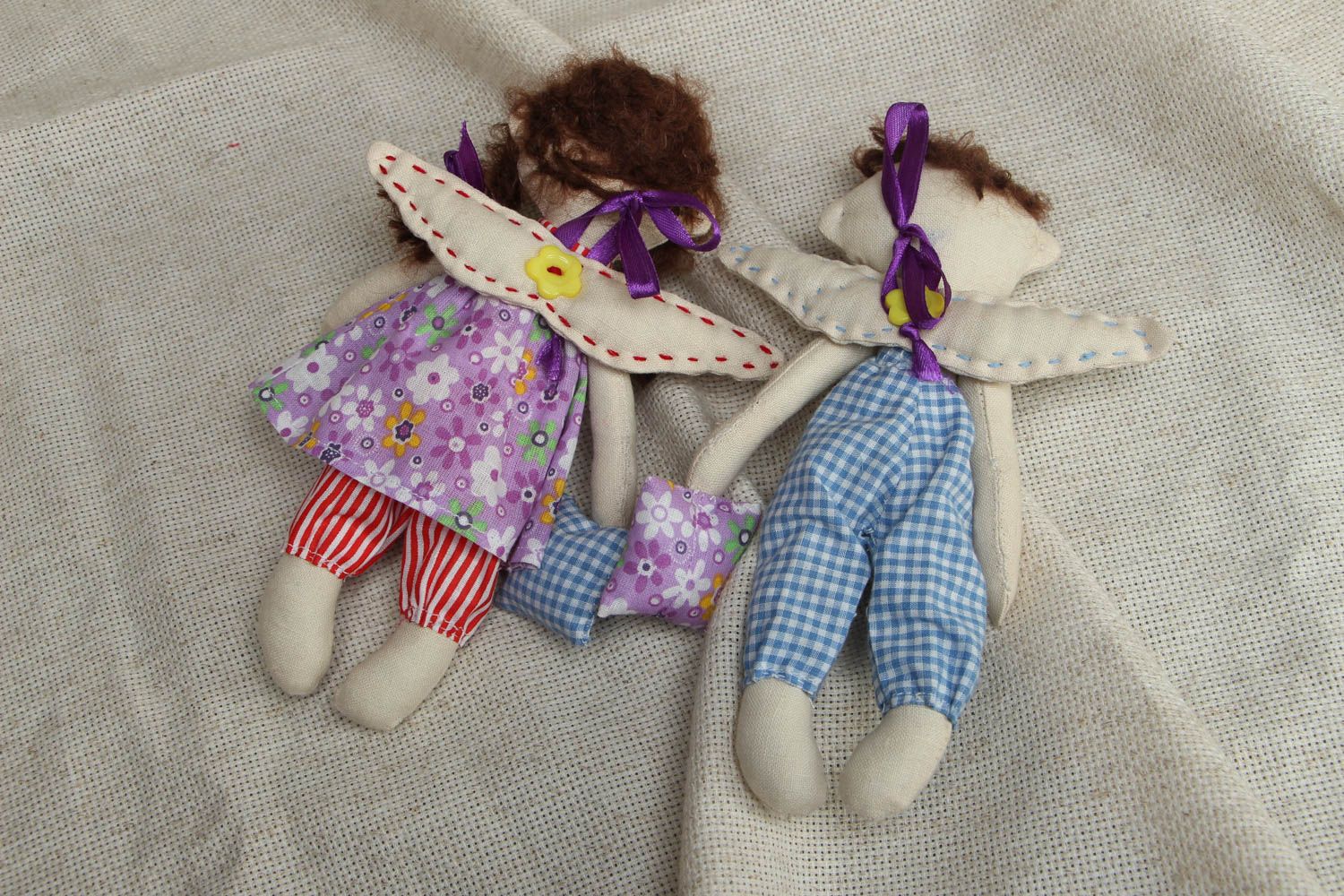Мягкие игрушки в виде двух спящих на облачке ангелочков фото 3