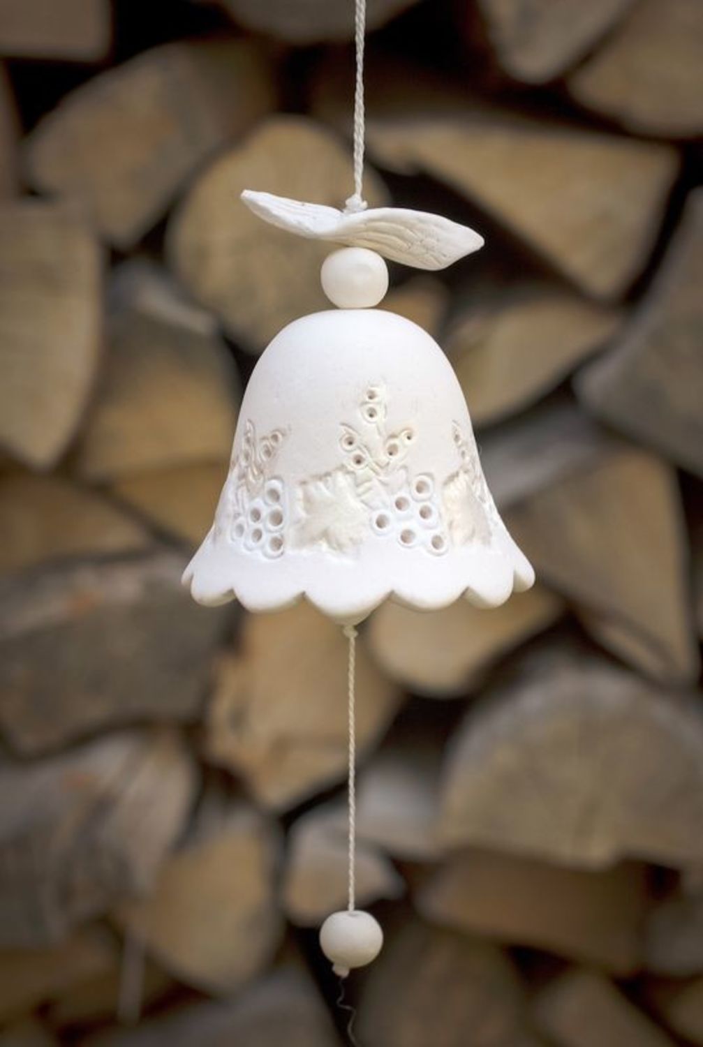 Lace bell made from white clay photo 1