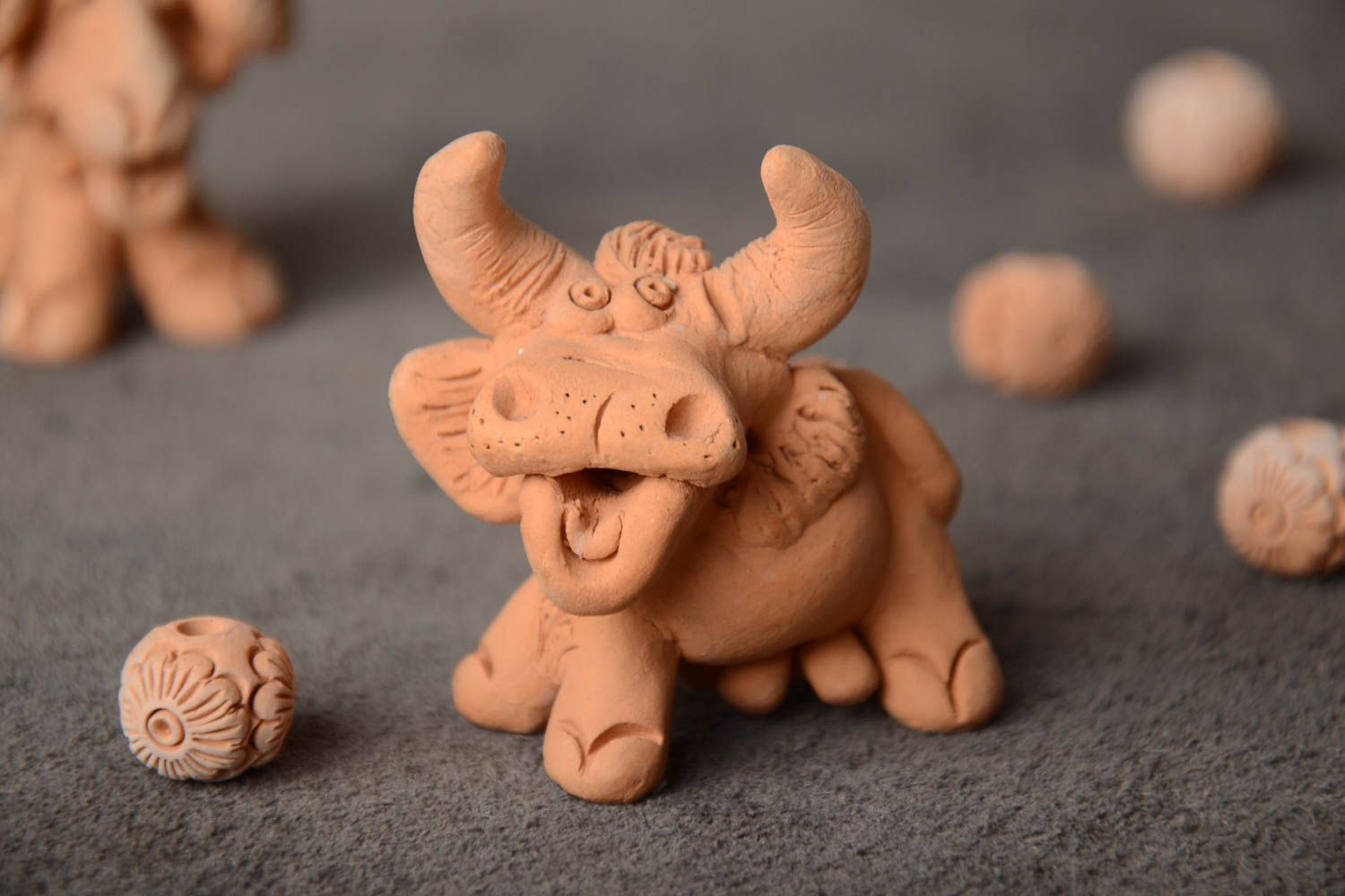 Small handmade collectible miniature ceramic animal figurine of bull  photo 1