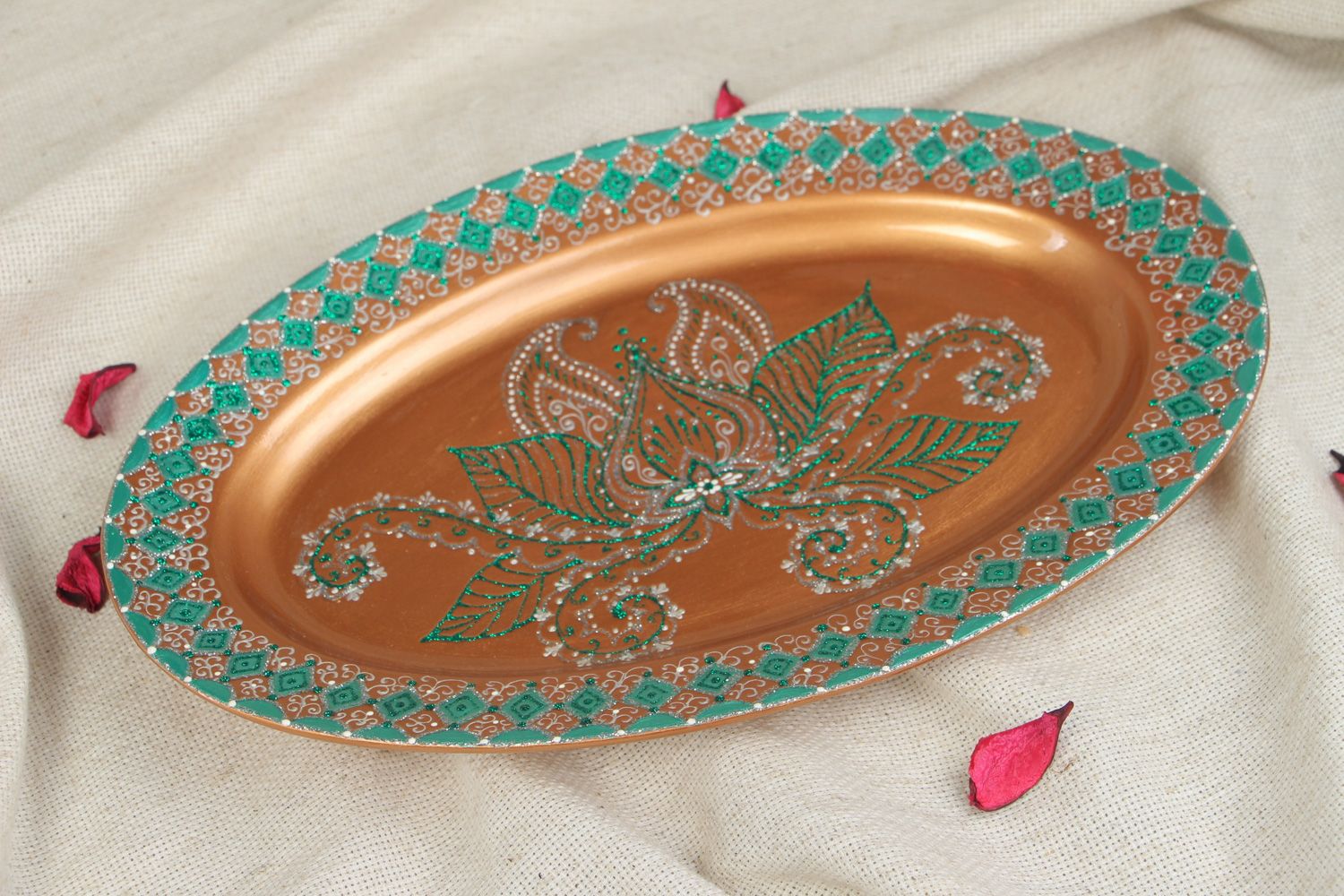 Large handmade ceramic dish of oval shape decorated with painted ornaments photo 5