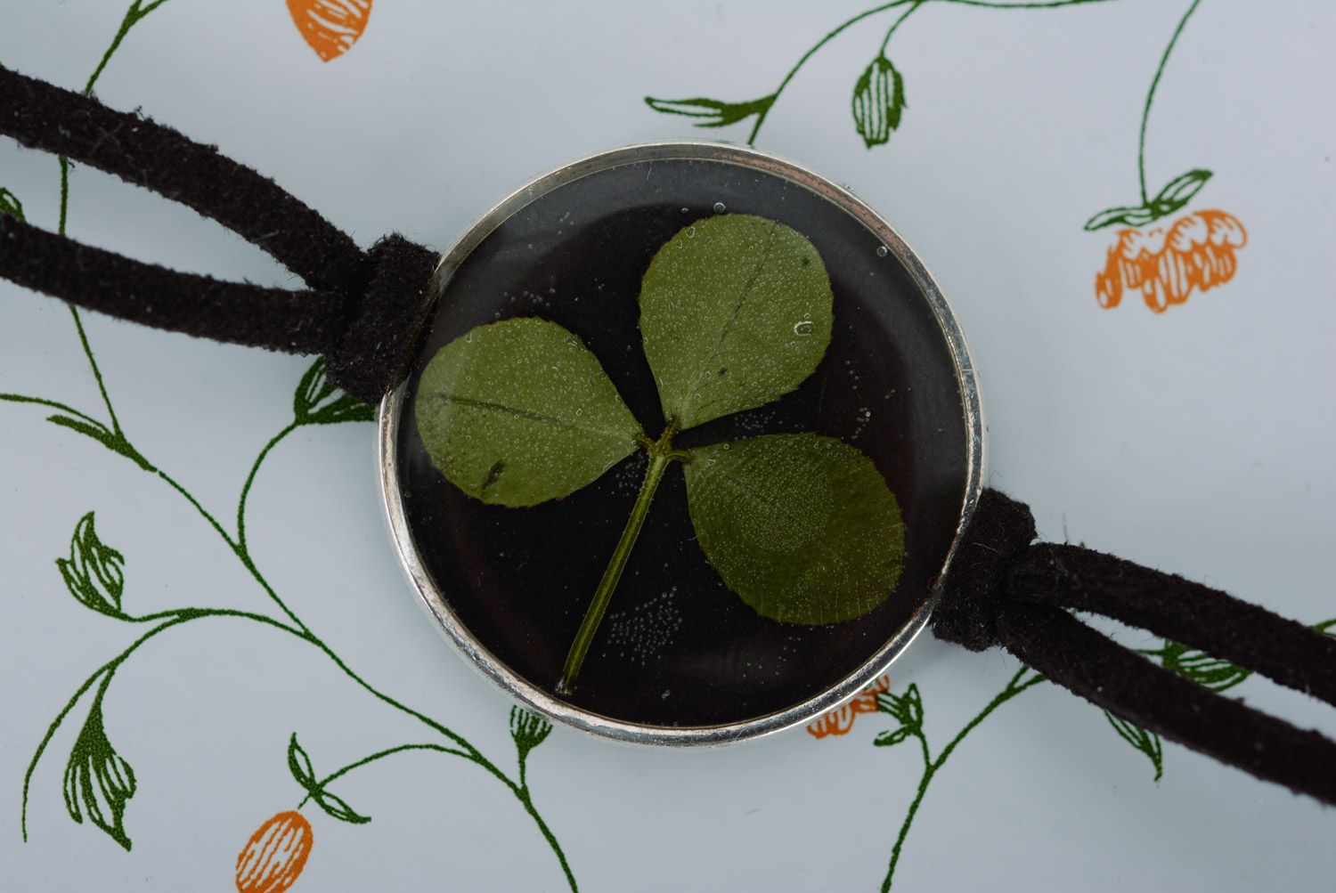 Handmade black wrist bracelet with clover in epoxy resin and leather cord  photo 5