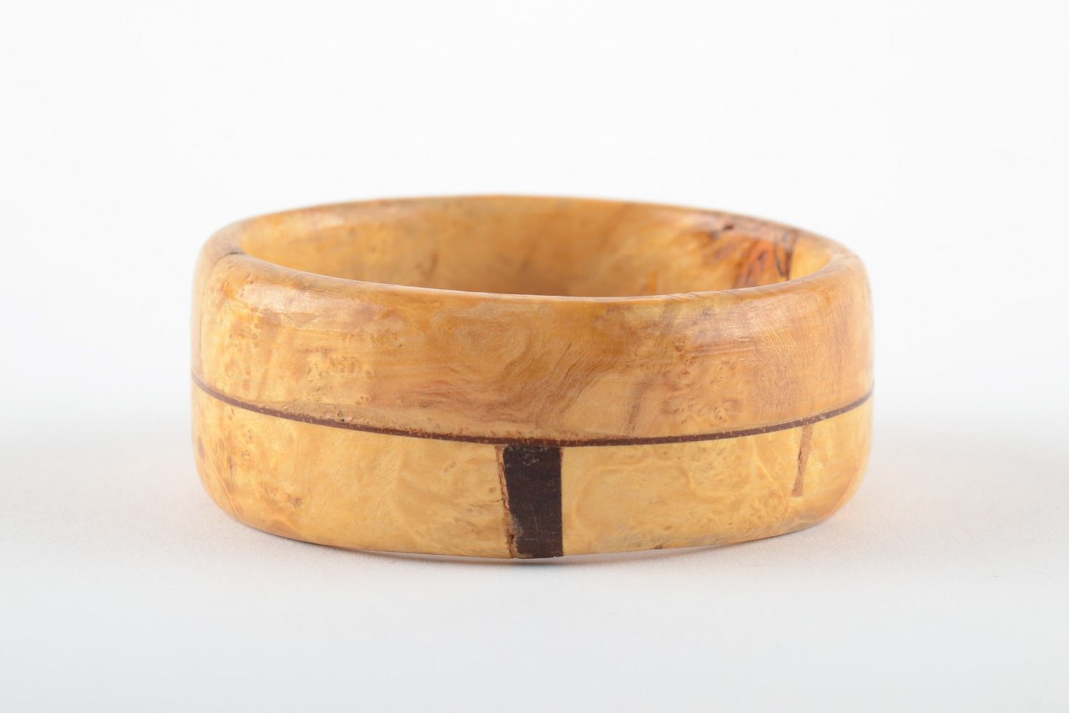 Fashionable handmade wrist bracelet carved of light wood and varnished for women photo 3