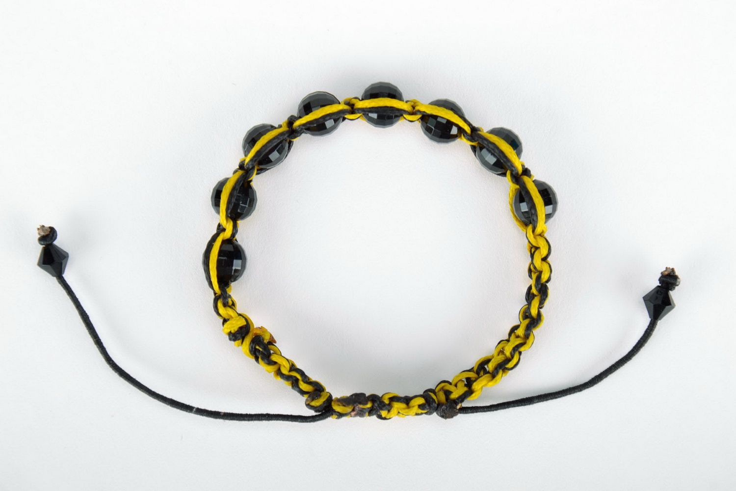 Yellow and black bracelet photo 4
