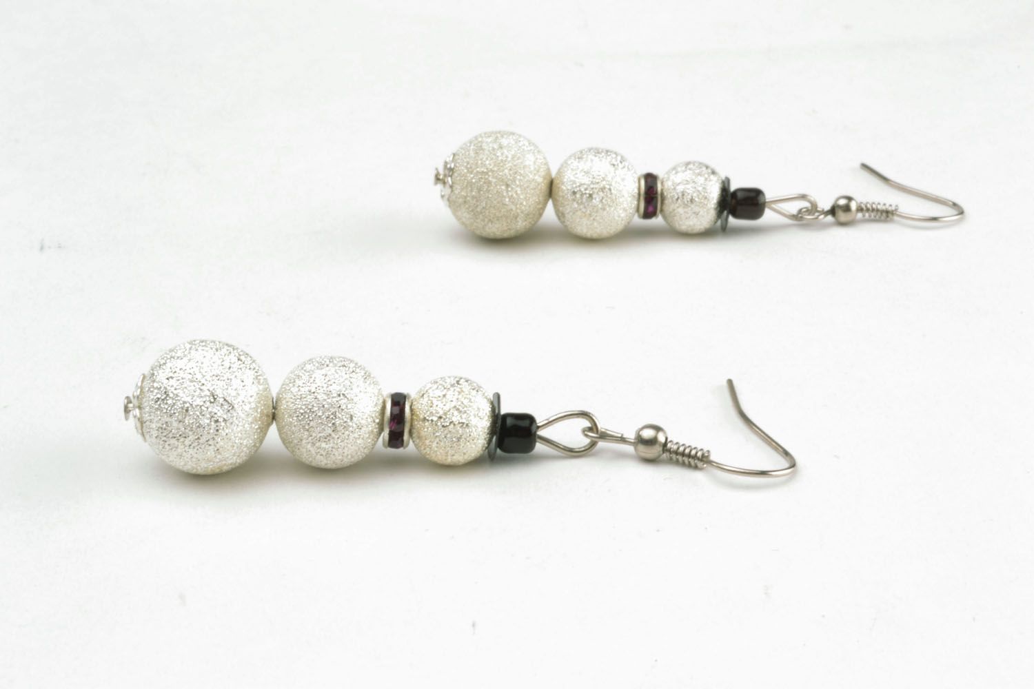 Long earrings with shiny beads photo 3