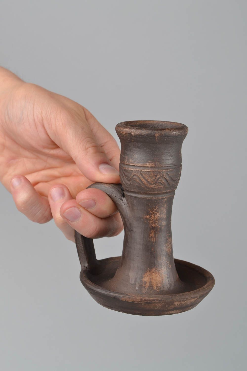 Handmade dark brown ethnic ceramic candlestick with handle polished  photo 2