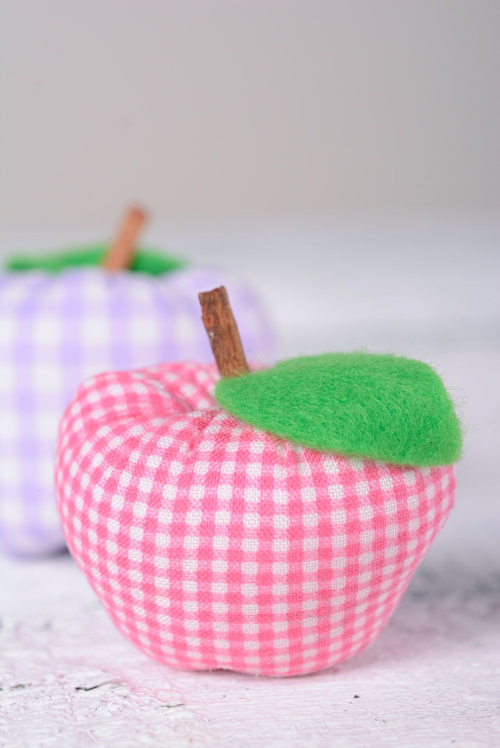 Handmade interior soft toy sewn of cotton in the shape of checkered apple photo 1