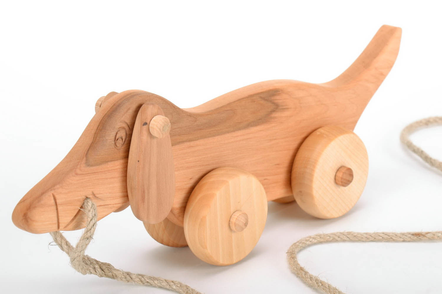 Wooden toy on wheels Dachshund photo 3