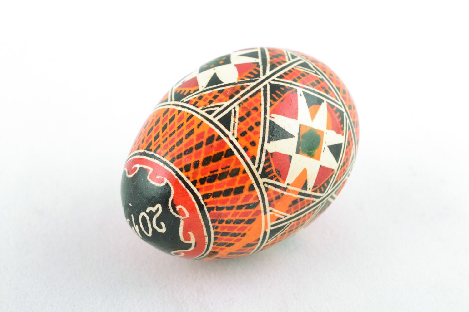 Traditional Easter egg pysanka with handmade painting made using wax technique photo 4