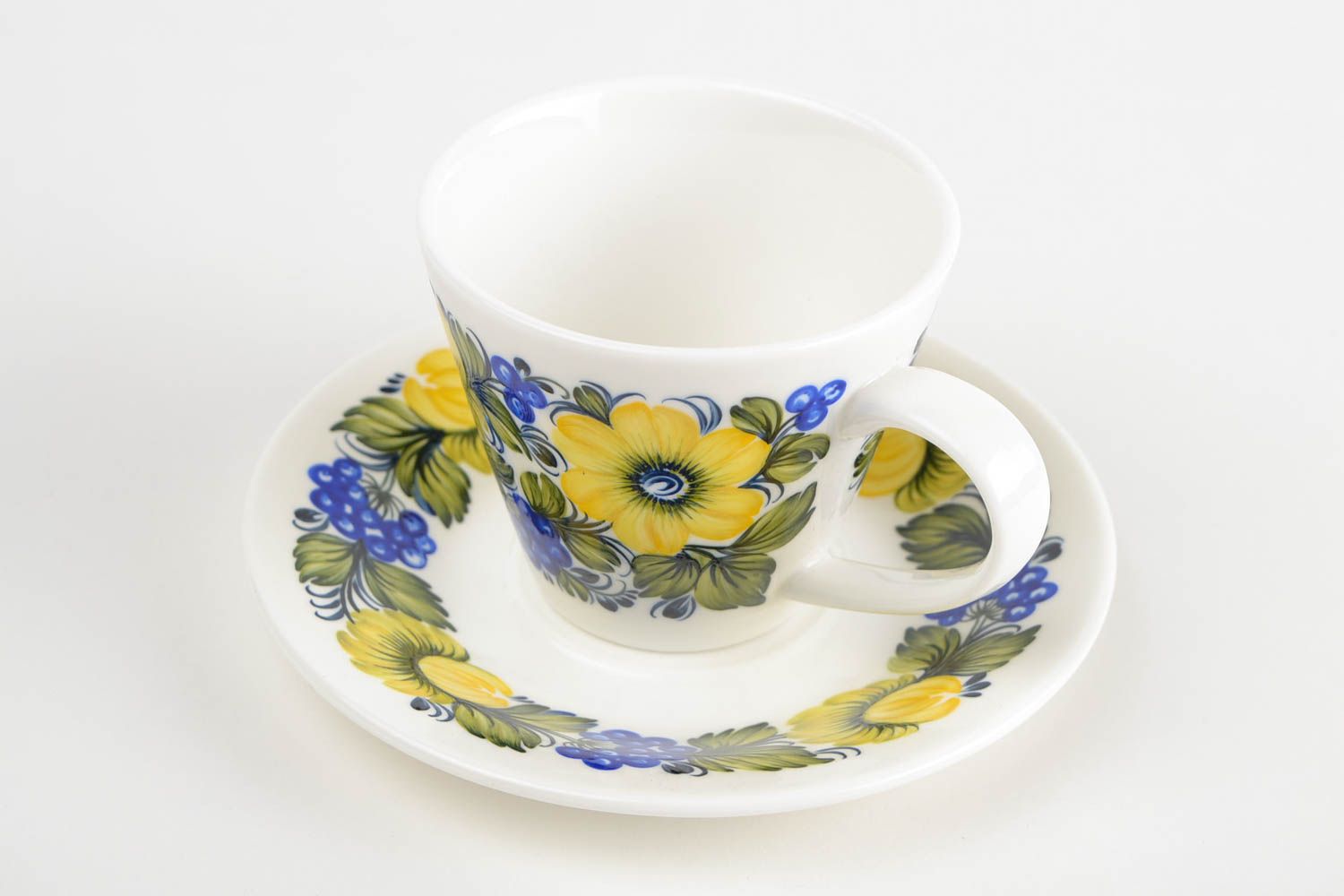 Porcelain white 5 oz coffee cup with saucer and yellow, blue floral pattern photo 3