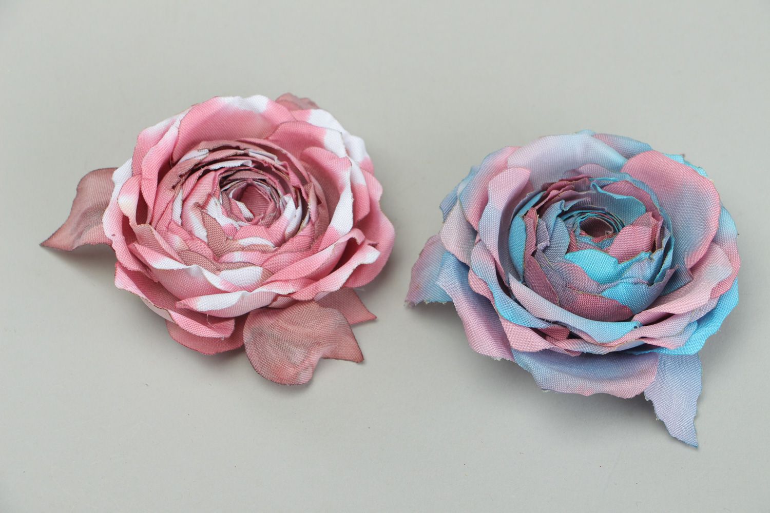 Set of handmade gabardine textile flower brooches of pink and blue colors Roses photo 1
