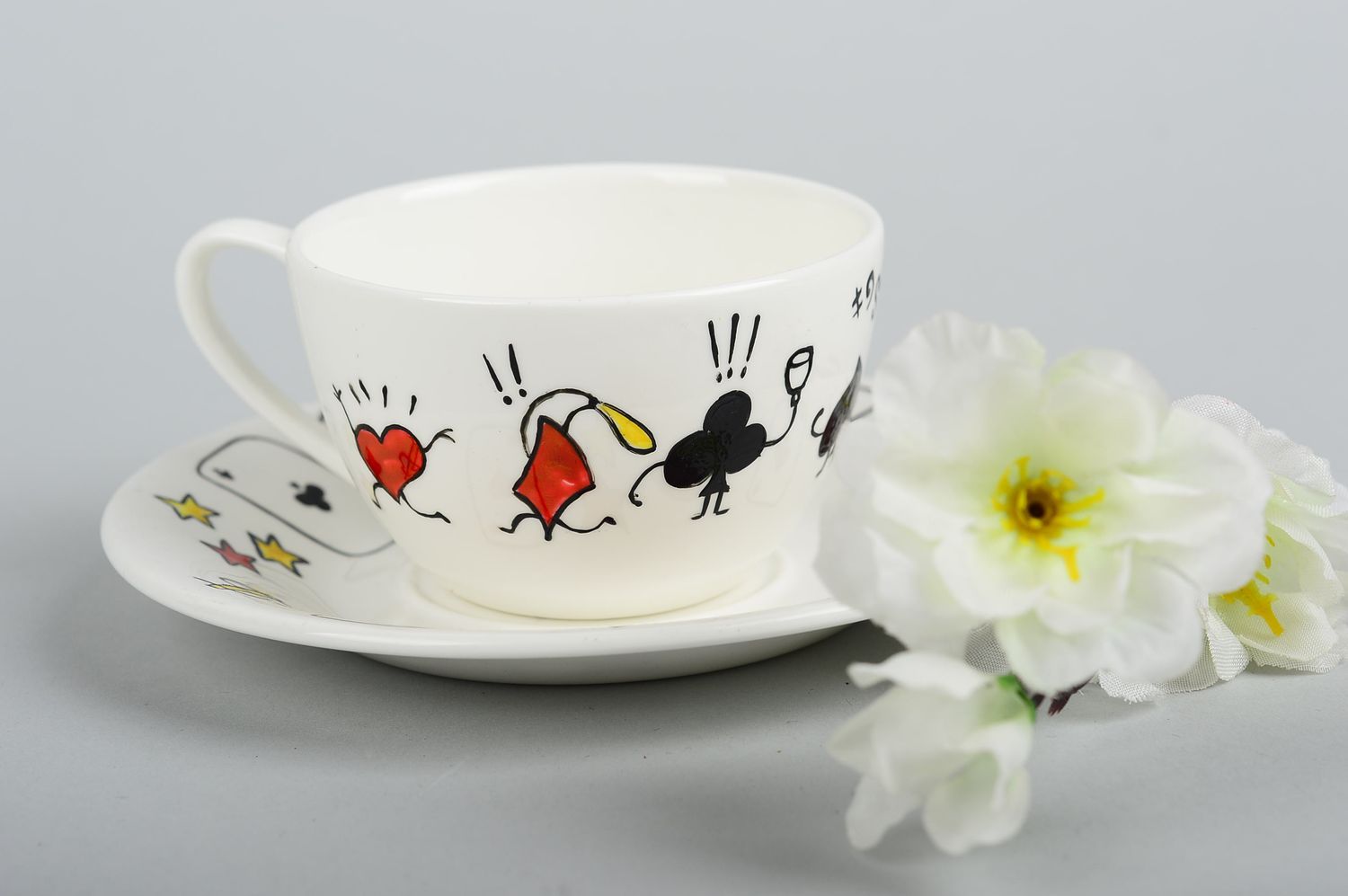 Art porcelain white coffee cup with saucer and playing cards' patter photo 1