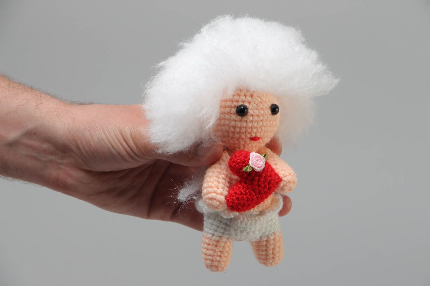 Handmade soft crochet toy in the shape of cute curly cupid with red heart photo 5