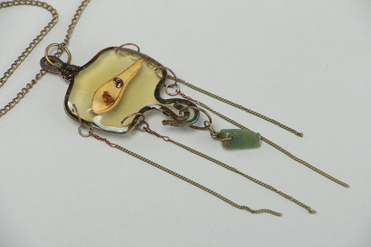 Handmade pendant with natural flowers in epoxy resin on long chain Jelly Fish photo 2
