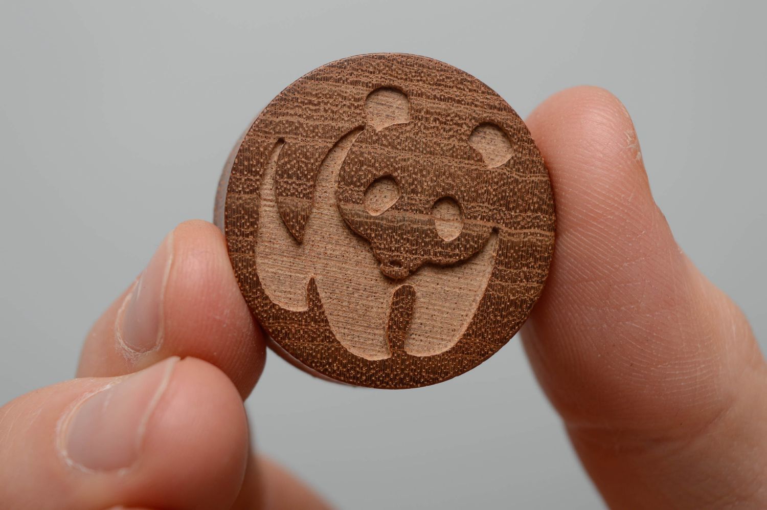 Wooden ear plugs with engraving in the shape of bears photo 3