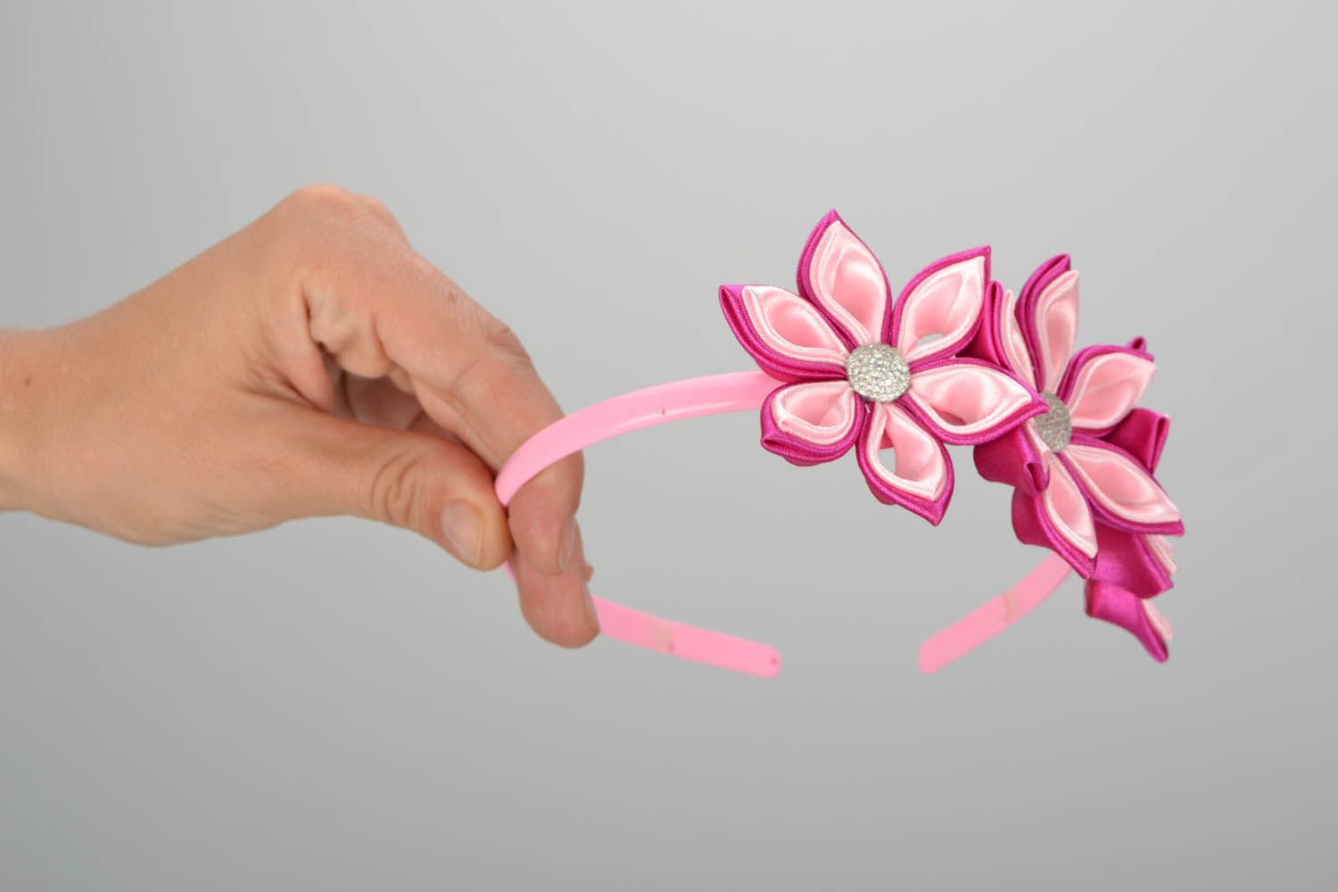 Pink hair band with flowers  photo 2