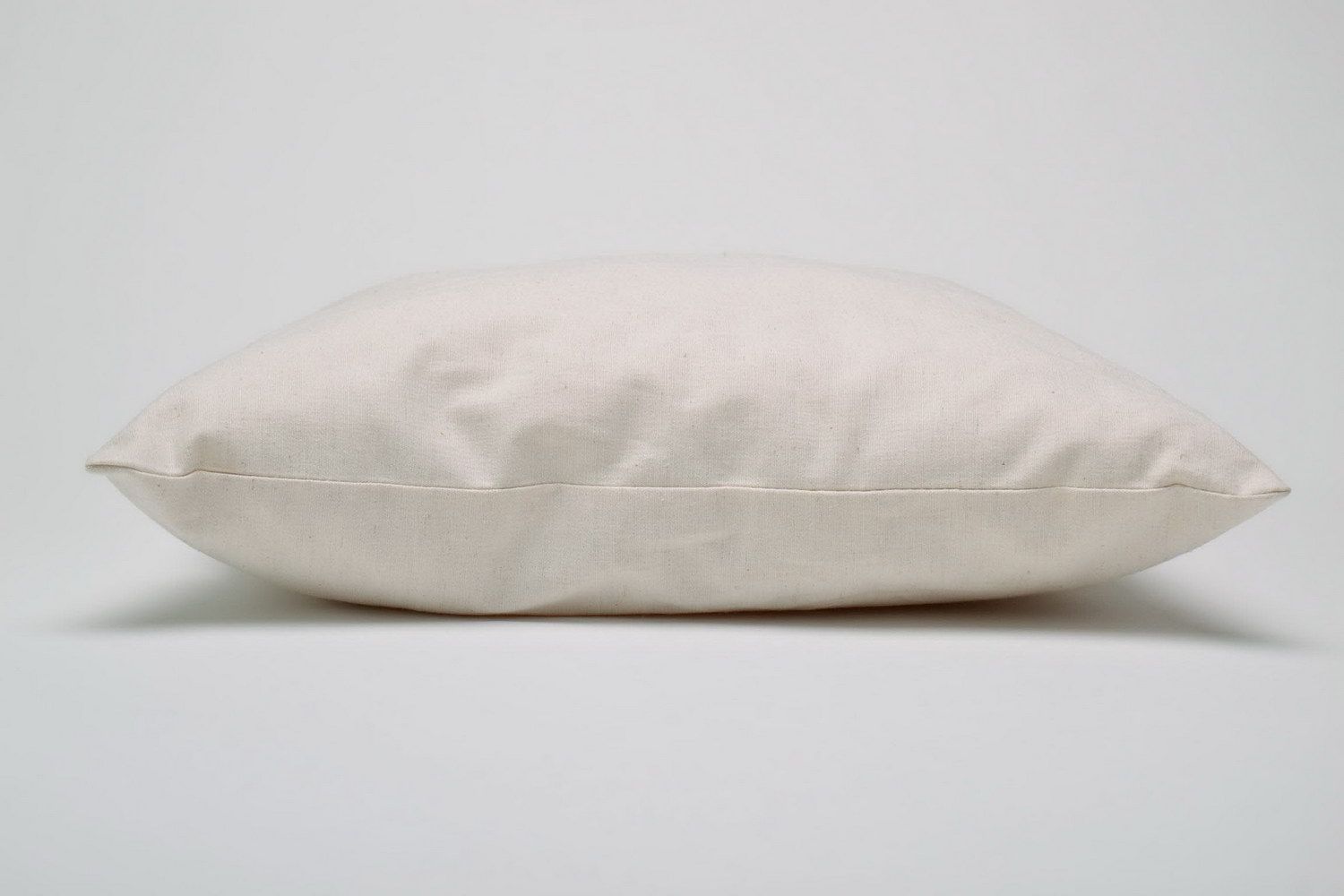 Almohada hecha a mano con relleno de plumón sintético foto 3