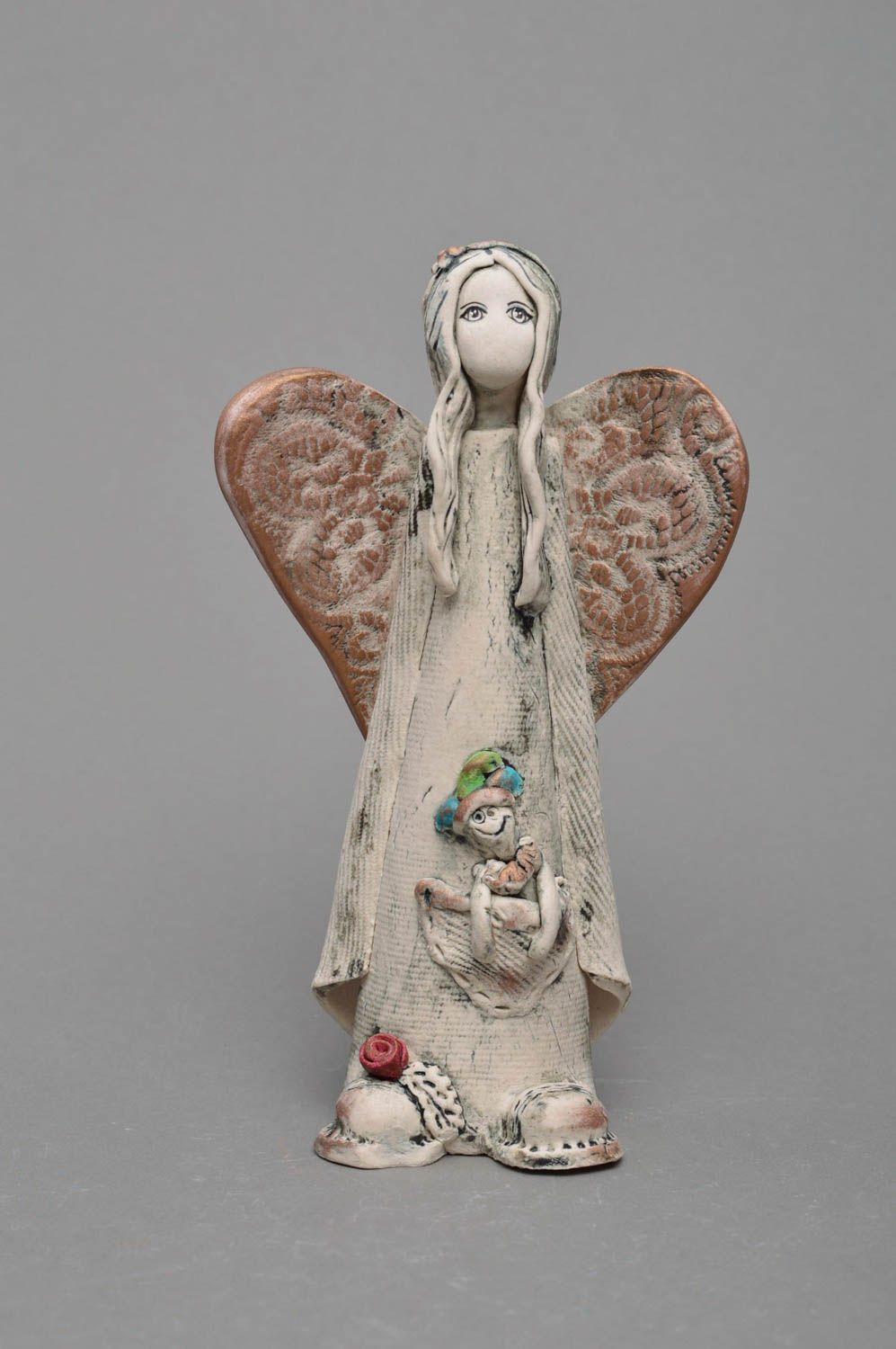 Unusual small handmade light porcelain statuette of angel with clown photo 1