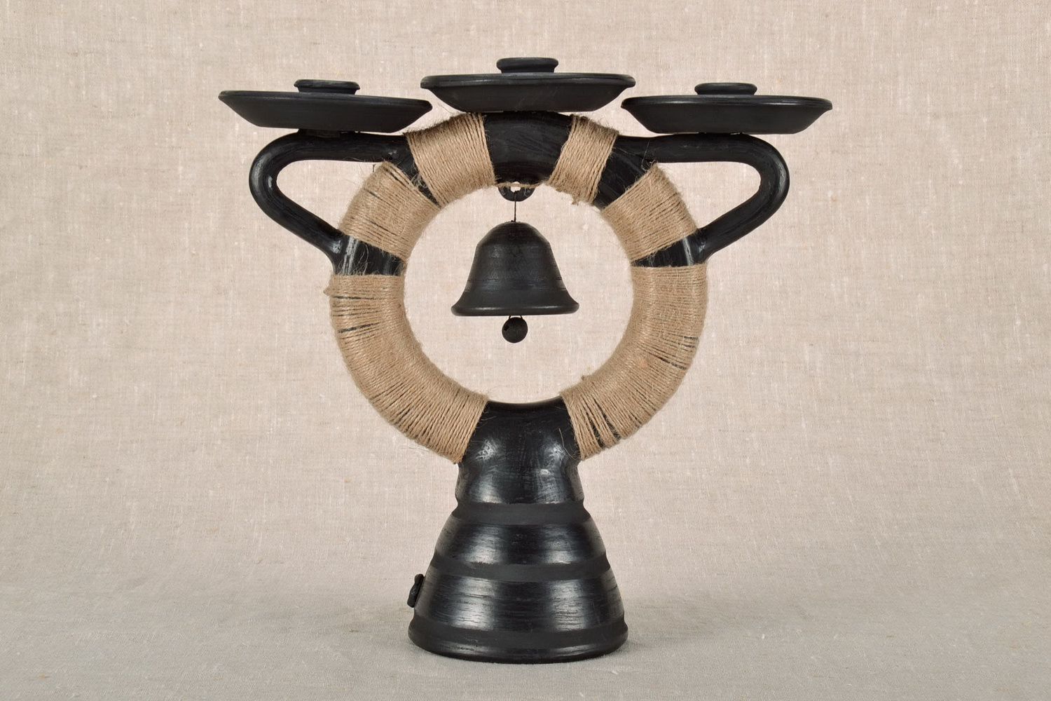 Ceramic candlestick with a bell photo 1