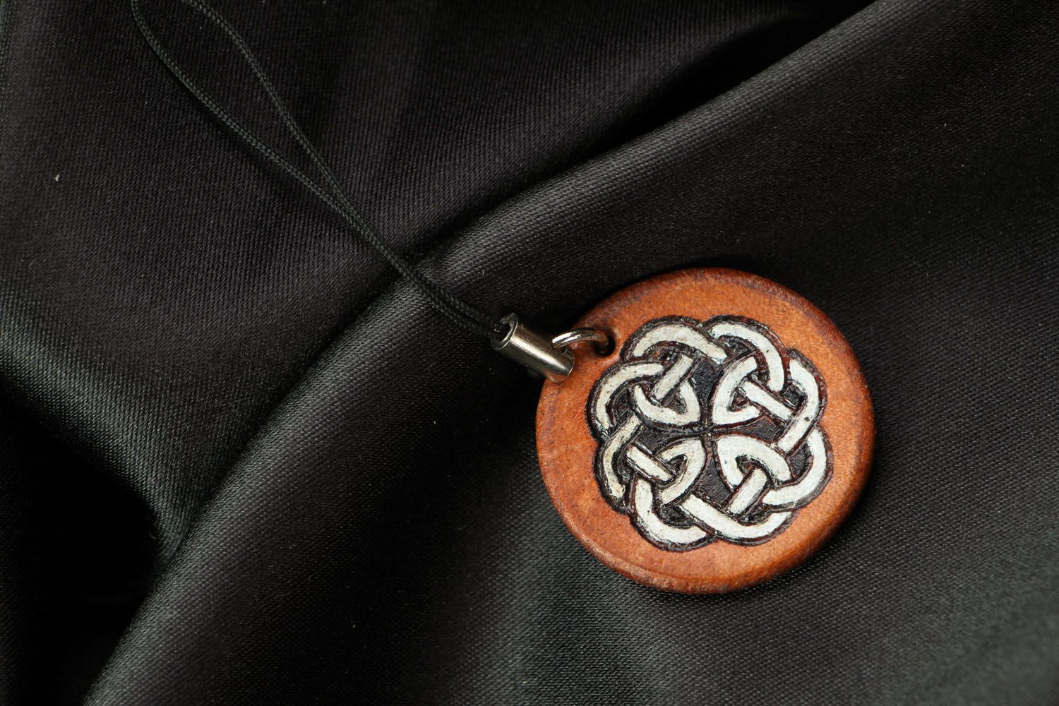 Leather keychain decorated using pyrography technique photo 1