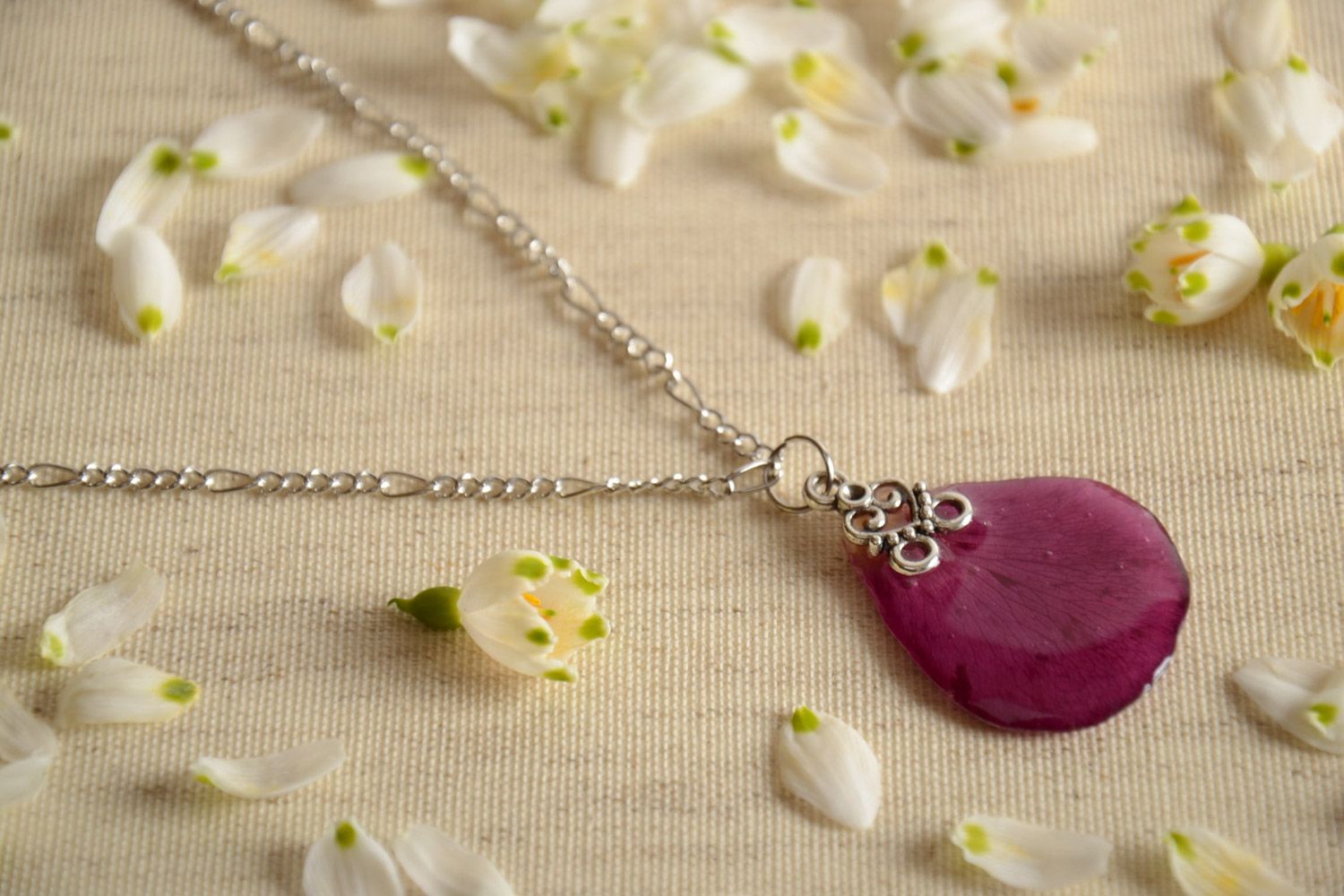 Handmade designer pendant with lilac flower petal in epoxy resin on chain photo 1