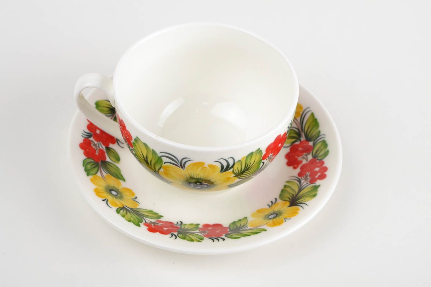 White porcelain elegant teacup with handle and Russian style floral pattern photo 5