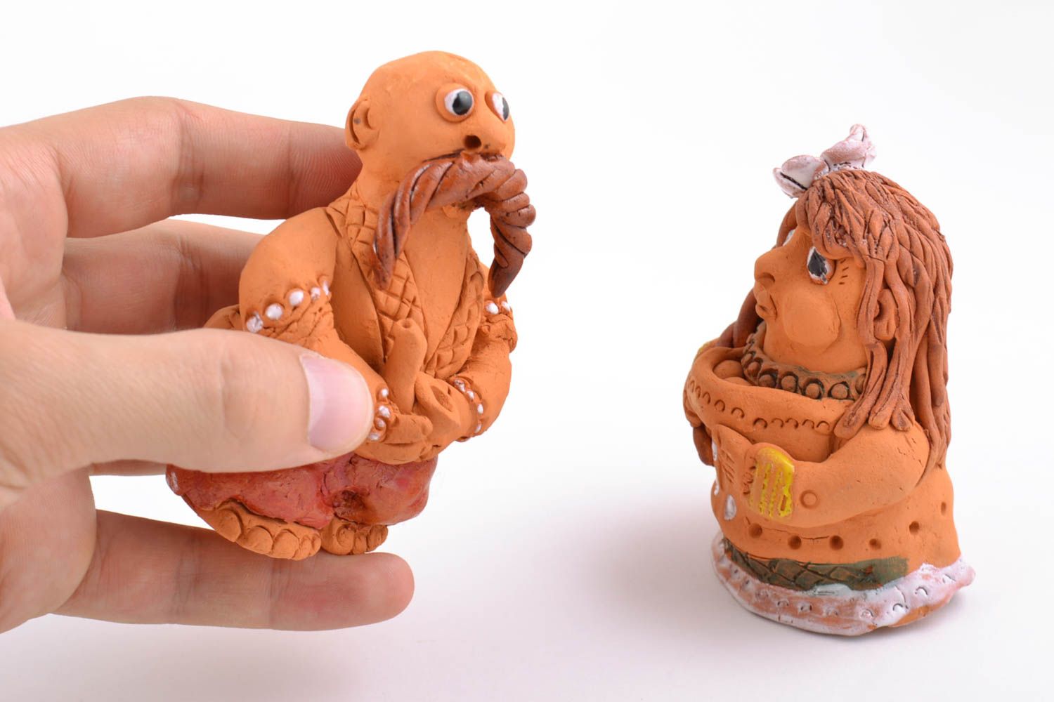 Handmade decorative figurines made of clay woman and man brown funny statuettes photo 2