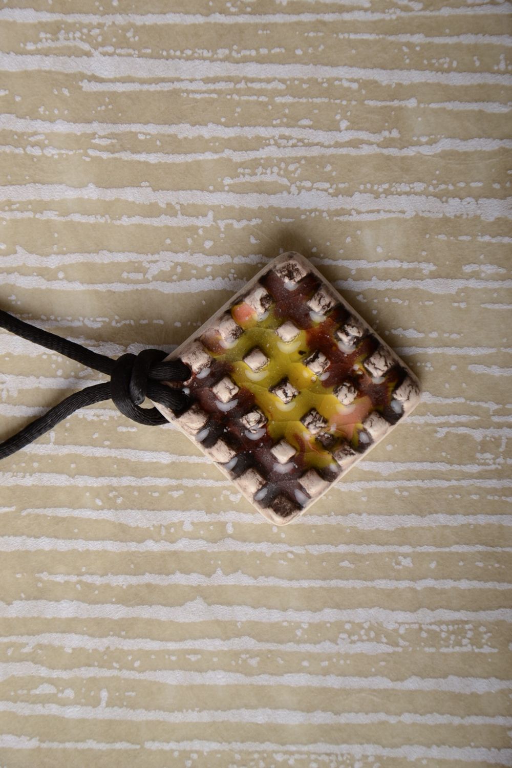 Designer clay pendant with cord photo 1