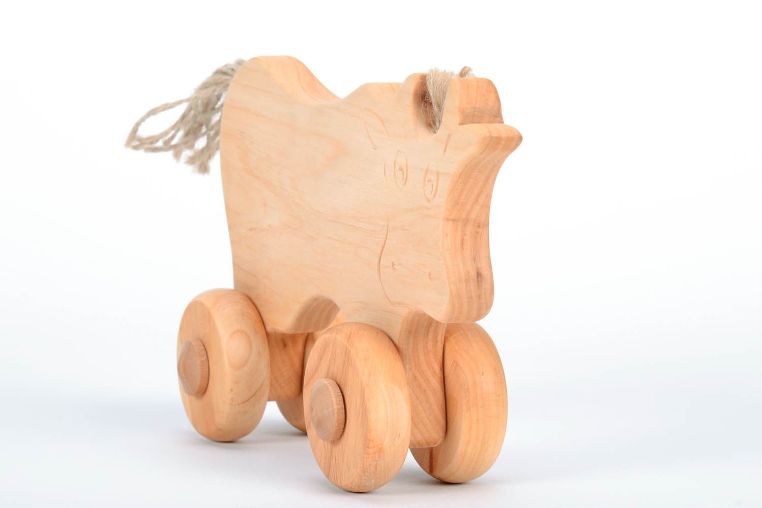 Wooden cow with wheels photo 4